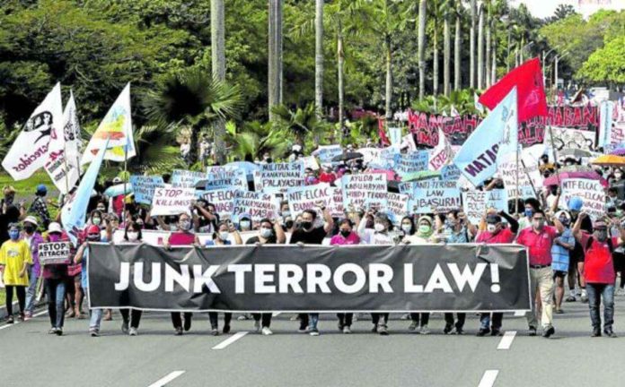 Various groups gather at the University of the Philippines in Quezon City in this December 2021 photo to call for the junking of the Anti-Terrorism Act of 2020 during the commemoration of International Human Rights Day. File photo by RICHARD A. REYES / Philippine Daily Inquirer