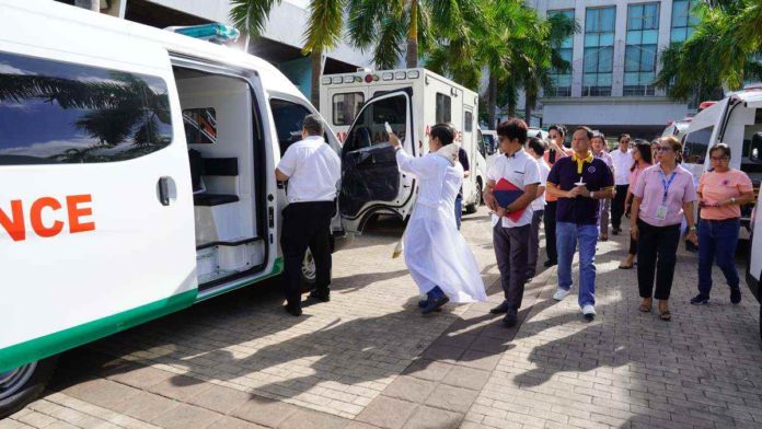 Gov. Arthur Defensor Jr., Provincial Administrator Raul Banias and Hospital Management Office chief Dr. Paz Calopiz lead the turnover of the six new ambulances to six district hospitals in Iloilo at the provincial capitol grounds on Monday morning, Feb. 19. BALITA HALIN SA KAPITOLYO FACEBOOK PHOTO