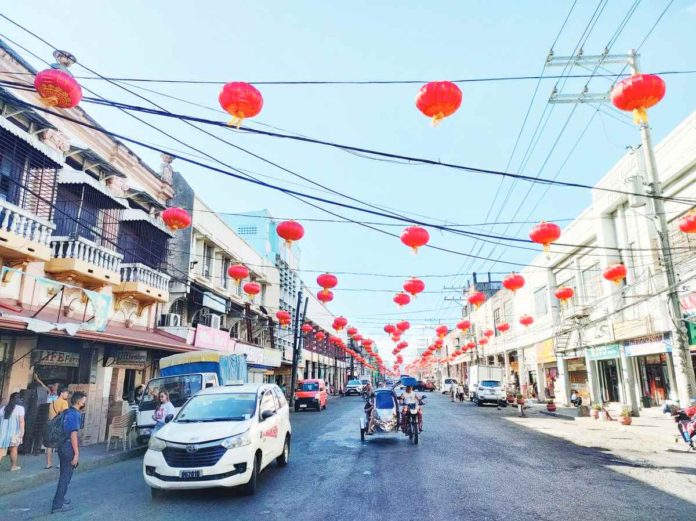 Chinese lanterns adorn Iznart Street in Iloilo City as the Filipino-Chinese community in the city prepares to celebrate Chinese New Year, which falls on Saturday, Feb. 10. AJ PALCULLO/PN