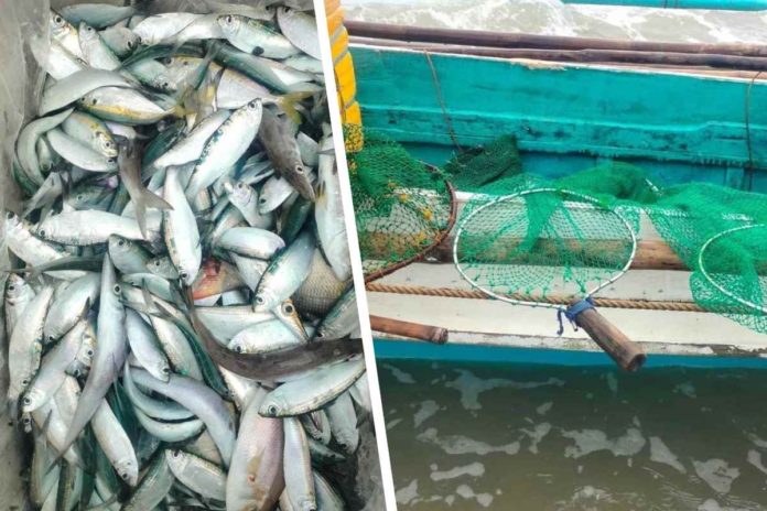 Personnel of the Iloilo Provincial Bantay Dagat Task Force and Concepcion Municipal Police seized this fishing boat engaged in dynamite fishing in Concepcion, Iloilo and 20 kilograms of assorted fish on Tuesday, Feb. 20. PHOTOILOILO PROVINCIAL BANTAY DAGAT TASK FORCE PHOTOS