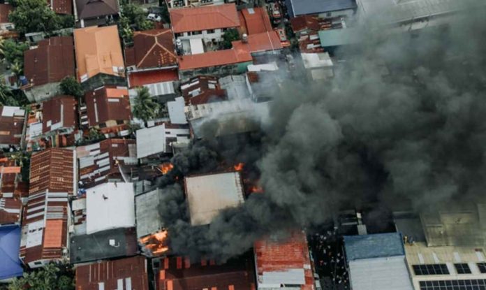 Around 150 individuals were displaced by a fire that broke out in Barangay San Nicolas, La Paz, Iloilo City past 4 p.m. on Sunday, February 18. The Bureau of Fire Protection Iloilo City has yet to determine the cause of the blaze. This aerial photograph captures the extent of the fire damage. MORE POWER ILOILO/FACEBOOK PHOTO