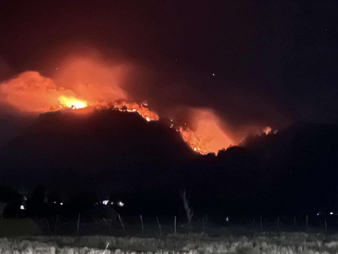 An overnight forest fire erupted in the mountainous village of Anini-y, Antique, on Monday, February 12. Photo Credit: Arvin Daniel Salmite