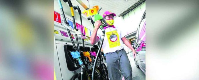 Oil companies will increase prices per liter of gasoline by P1.60, diesel by P1.10, and kerosene by P1.05. INQUIRER PHOTO / NINO JESUS ORBETA PHOTO