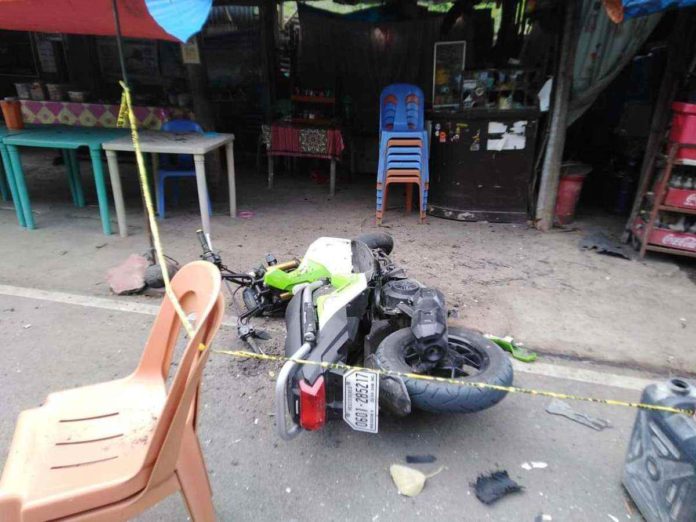 Three persons survived a grenade lobbing incident in San Carlos City, Negros Occidental on Tuesday. Photo shows the damaged police motorcycle parked in the area at the time of the incident. REDALERT Z SWAROVKIE / FACEBOOK