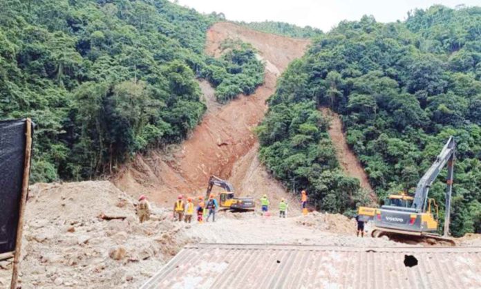 Excavators and other heavy equipment work to dig for more survivors in the landslide that buried parts of a mining community in Masara village, Macoo town, Davao de Oro on Feb. 10, 2024. File photo by FRINSTON LIM / Inquirer Mindanao