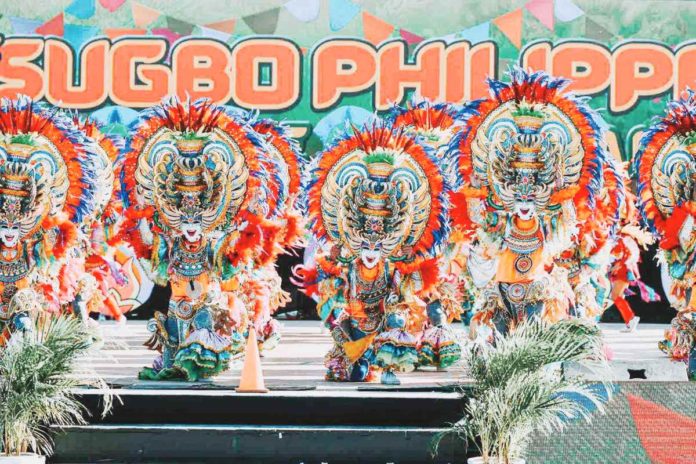 Performers from Barangay Granada, Bacolod City, champions of the 2023 MassKara Festival, captivate Cebu City in a performance during the Sinulog Festival in January this year. BACOLOD CITY PUBLIC INFORMATION OFFICE PHOTO