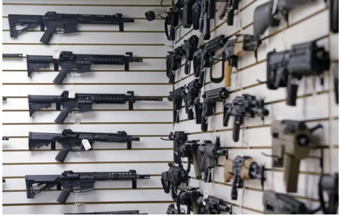 According to the Philippine National Police, private citizens can now have a license to own rifles with the classification of semi-automatic. Photo shows a display of various models of semi-automatic rifles. AP