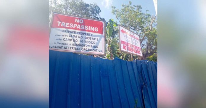 A parcel of land in Boracay Island in Malay, Aklan has been cordoned off by armed security after the Department of Agrarian Reform canceled the 2018 Certificate of Land Ownership Award granted to members of the Ati community in the island. PHOTO VIA BORACAY ISLAND NEWS NETWORK