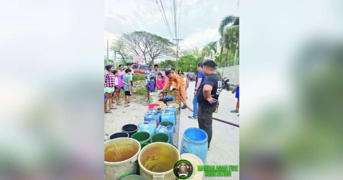 The Bureau of Fire Protection in Bacolod City supplies free water to residents affected by the water shortage. BFP-BACOLOD