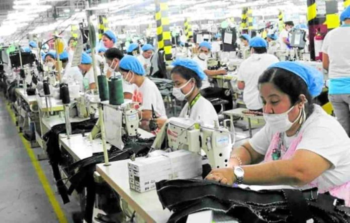 According to employers, if a one-time big-time pay hike were to happen, businesses may either push up the cost of goods to make up for losses due to the wage increase, lay off their workers, or firms still recovering from the impact of COVID-19 may be forced to close. Photo shows laborers at work in a factory at the Mactan Export Processing Zone in Lapu-Lapu City. Photo from the Facebook account of the MEPZ Workers Alliance