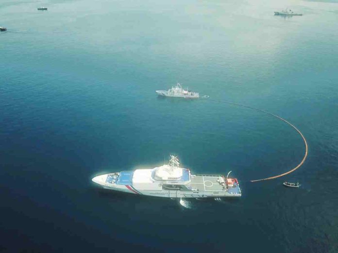 The Philippine Coast Guard conducts integrated maritime drills as part of the Regional Marine Pollution Exercise in the waters off Makassar, Indonesia in May 2022. PHILIPPINE COAST GUARD PHOTO / FACEBOOK