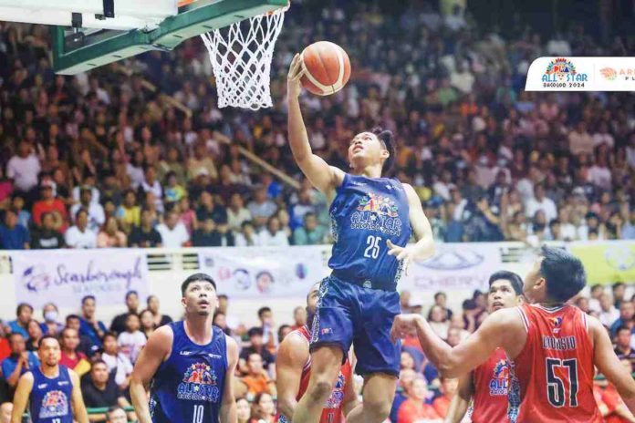 Team Mark’s Ricci Rivero goes for a reverse layup. PBA PHOTO