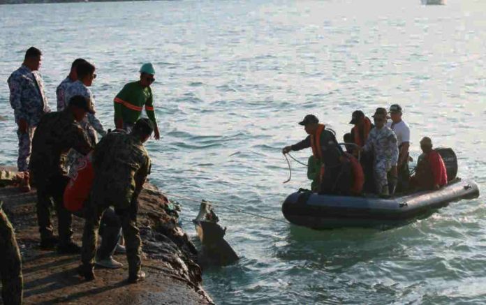 Four Guimaras fishermen safely reunited with their families at the ro-ro wharf in Barangay Hoskyn, Jordan town on April 15, six days after their boat capsized in the waters between Guimaras and Negros Occidental. GUIMARAS BROADCASTING SERVICE PHOTOS