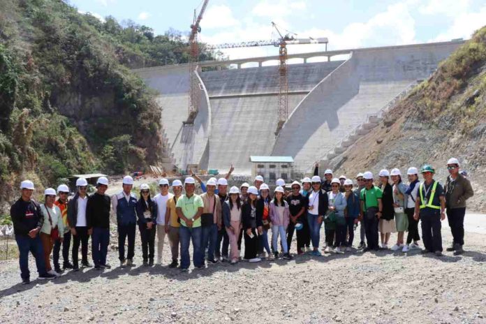 This is one of the three dams of the Jalaur River Multi-Purpose Project Stage II (JRMP II) in Calinog, Iloilo. Photo shows key personnel and staff of the National Irrigation Administration - Region IX making a site visit on April 12-17, 2024 as part of the agency’s “Training Immersion and Knowledge Exchange on Entrepreneurial Practices and Innovation”. This mega dam project is envisioned to provide irrigation water to farmers, particularly in rice-producing areas of Iloilo province. NIA-6 OHOTO