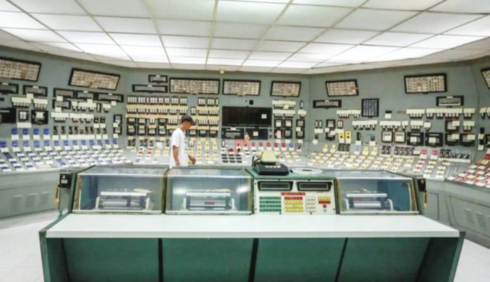 A maintenance technician walks along the central control room of the Bataan Nuclear Power Plant in Morong, Bataan in September 2016. JONATHAN CELLONA, ABS-CBN NEWS/FILE PHOTO