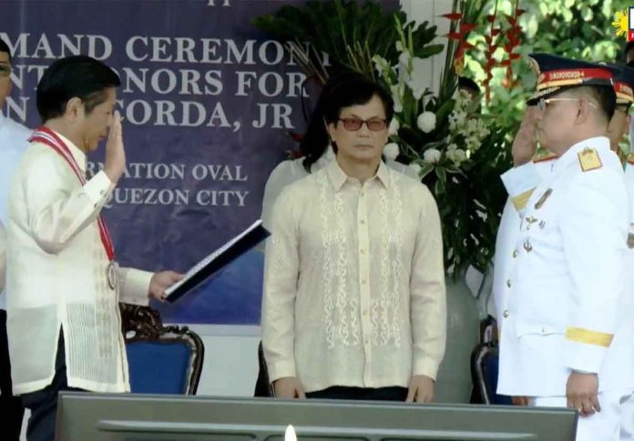 President Ferdinand R. Marcos Jr. swears in new Philippine National Police chief Gen. Rommel Francisco Marbil as Interior Secretary Benjamin Abalos Jr. looks on. PCO