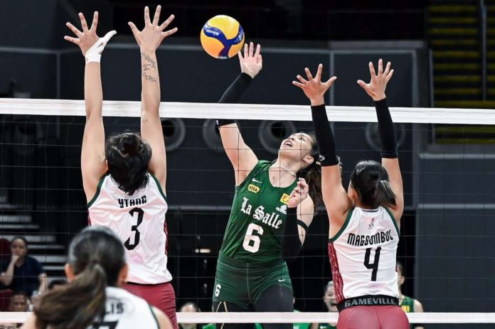 De La Salle University Lady Spikers’ Alleiah Malaluan attempts to score against the defense of the University of the Philippines Fighting Maroons. UAAP PHOTO