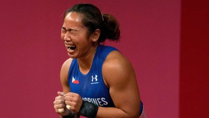 Filipina weightlifter Hidilyn Diaz-Naranjo fails to qualify for the 2024 Paris Olympics. FILE PHOTO COURTESY OF TOKYO OLYMPICS