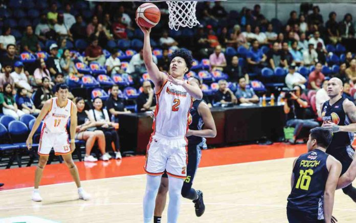 NorthPort Batang Pier’s John Michael Calma goes for an easy basket inside. PBA PHOTO