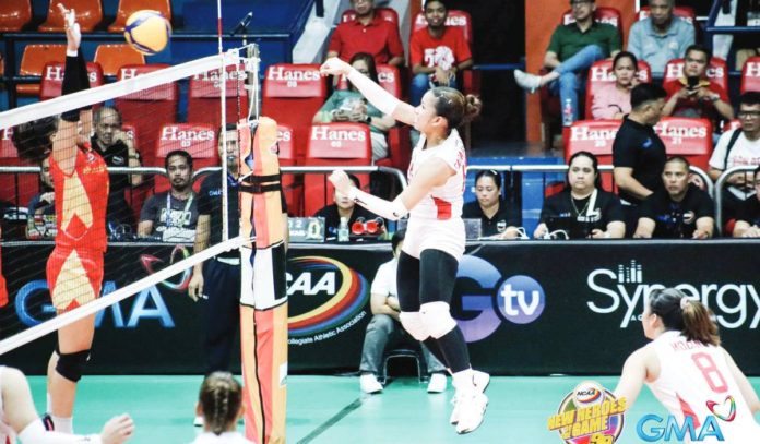 Negrense Sophie Cagalawan of San Beda University Lady Red Spikers smashes the ball towards the defense of San Sebastian College Lady Stags. PHOTO COURTESY OF NCAA/GMA SPORTS