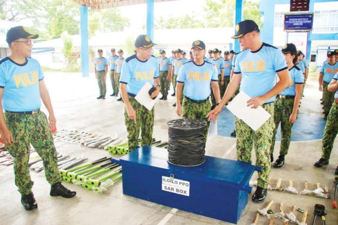 Police Colonel Bayani Razalan, officer-in-charge director of the Iloilo Police Provincial Office (IPPO), leads the inspection and inventory of search and rescue equipment at the Camp Francisco U. Sumagaysay Sr. in Santa Barbara, Iloilo on Tuesday, May 28. This activity aims to ensure that police personnel are fully equipped and prepared to effectively handle various types of disasters and emergencies. IPPO PHOTO