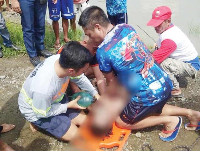 The 16-yar-old boy’s lifeless body was found after an hour of rescue and retrieval operation in a river in Sitio Caminacan, Barangay Batuan, Dueñas, Iloilo on Friday morning, May 31. K5 NEWS FM ILOILO/FACEBOOK PHOTO