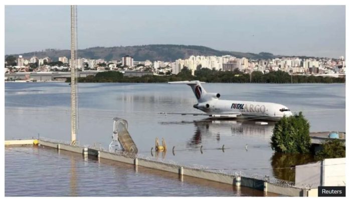 A cargo plane sits on a flooded runway at the airport in Porto Alegre, Rio Grande do Sul, Brazil. With runways under water, getting aid to flood-hit affected areas has been hard. REUTERS