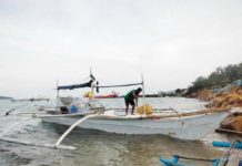 Personnel of the Iloilo Provincial Bantay Dagat Task Force apprehended illegal fishers onboard a motorboat in the municipal waters of Concepcion, Iloilo in January 2024. ILOILO PROVINCIAL BANTAY DAGAT TF PHOTO