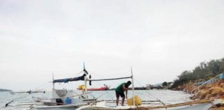 Personnel of the Iloilo Provincial Bantay Dagat Task Force apprehended illegal fishers onboard a motorboat in the municipal waters of Concepcion, Iloilo in January 2024. ILOILO PROVINCIAL BANTAY DAGAT TF PHOTO