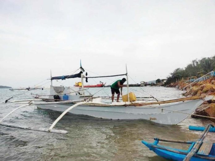 Personnel of the Iloilo Provincial Bantay Dagat Task Force apprehended illegal fishers onboard a motorboat in the municipal waters of Concepcion, Iloilo in January 2024. ILOILO PROVINCIAL BANTAY DAGAT TF PHOTO