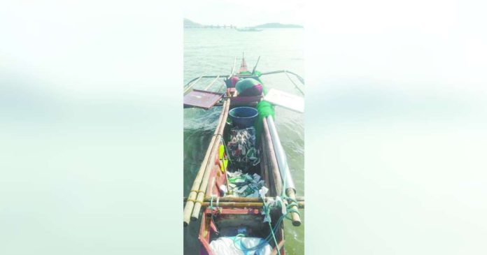 This hulbot-hulbot boat was apprehended for illegal fishing in the municipal waters of Concepcion, Iloilo. RAUL BANIAS FILE PHOTO
