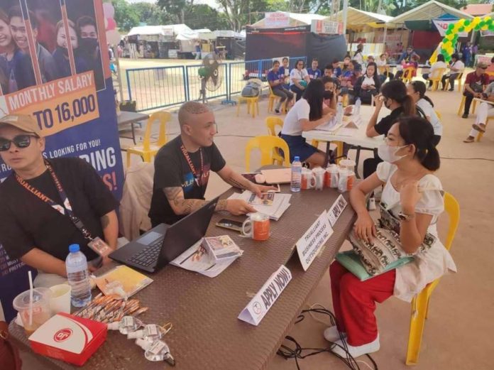 Employers interview applicants during the Manggahan Job Fair 2023 in Jordan, Guimaras. TRUALLIANT FACEBOOK PHOTO