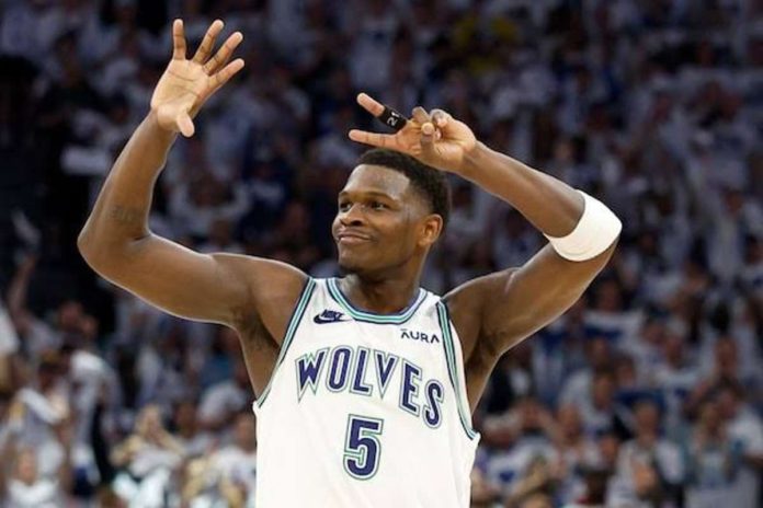 Minnesota guard Anthony Edwards gestures “seven” to the crowd as the Timberwolves send their NBA Western Conference semifinals series with Denver Nuggets to a do-or-die Game 7. PHOTO BY DAVID BERDING/GETTY IMAGES