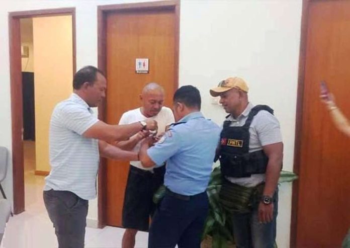 This photo from the Department of Justice shows former congressman Arnolfo Teves Jr. (second from left) after his arrest in Dili, Timor Leste in March 2024.