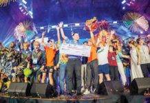 Iloilo City’s Dinagyang Festival, represented by Tribu Pan-ay, emerged as champion of the Aliwan Fiesta 2024 and brought home a grand prize of P1.5 million. Tribe warriors were joined by Iloilo Festivals Foundation, Inc. (IFFI) chairman Rito Carlos “Judgee” Peña (center) and other IFFI officers at the stage during the awarding ceremony on Saturday night, June 29. JERRY TREÑAS/FACEBOOK PHOTO