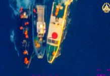 This frame grab from a handout video taken on June 17, 2024 and released by the Armed Forces of the Philippines Public Affairs Office shows an aerial view of a Philippine Rigid Hull Inflatable Boat (center) being sandwiched by two China coast guard vessels during an incident off Second Thomas Shoal in the South China Sea.