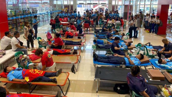 Voluntary blood donors queue during the mass blood donation activity organized by the Philippine Information Agency and Capiz Association of Government Public Information Officers in March 2024 in Roxas City. PHOTO COURTESY OF PIA CAPIZ