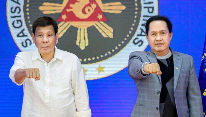 In this undated photo, former president Rodrigo Duterte and friend Pastor Apollo Quiboloy do the so-called “Duterte fist bump”. Quiboloy is currently in hiding. He has a standing a warrant of arrest from the Davao Regional Trial Court for the charge of violating Republic Act 7610 or the Anti-Child Abuse Law, specifically the provision on sexual abuse of minor and maltreatment.