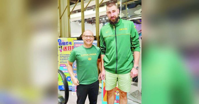 Negrense coach Tata Belangel with Lithuania basketball team center Jonas Valanciunas. PHOTO COURTESY OF TATA BELANGEL