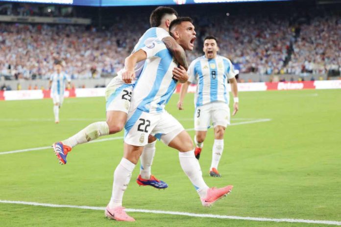 Lautaro Martinez (No. 22) and teammates celebrate after he fired a late goal to give Argentina all three points and book their spot in the next round of Copa America. DAILYMAIL PHOTO