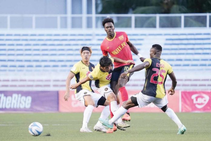 Kaya Futbol Club-Iloilo players try to block a Manila Diggers FC player from reaching the ball. PHOTO COURTESY OF KAYA-ILOILO