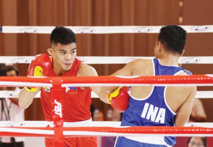 Carlo Paalam earned a ticket to the 2024 Paris Olympics after a unanimous decision win over Indian Sachin Siwach. PHOTO COURTESY OF PSC-POC MEDIA BUREAU