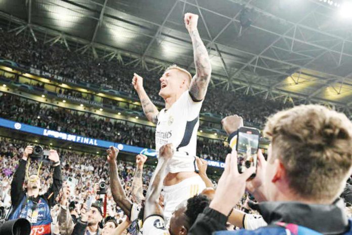 Real Madrid C.F.’s Toni Kroos celebrates winning his sixth UEFA Champions League title. He is set to retire after the season. PHOTO BY MUSTAFA YALCIN/GETTY IMAGES