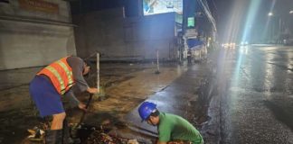 Personnel of Bacolod City Disaster Risk Reduction and Management Office conducted clearing of drainage inlets clogged by mixed garbage on Araneta Street and Araneta Street-Alijis Road Old Airport early Wednesday morning, July 24. BACOLOD CDRRMO PHOTO