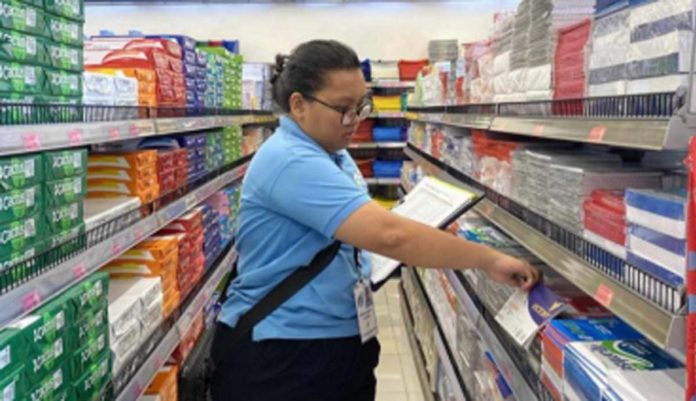 A Department of Trade and Industry – Iloilo staff reviews the prices of school supplies, ensuring compliance with the newly updated pricing guide ahead of the 2024-2025 academic year starting July 29, 2024. DTI REGION 6 PHOTO