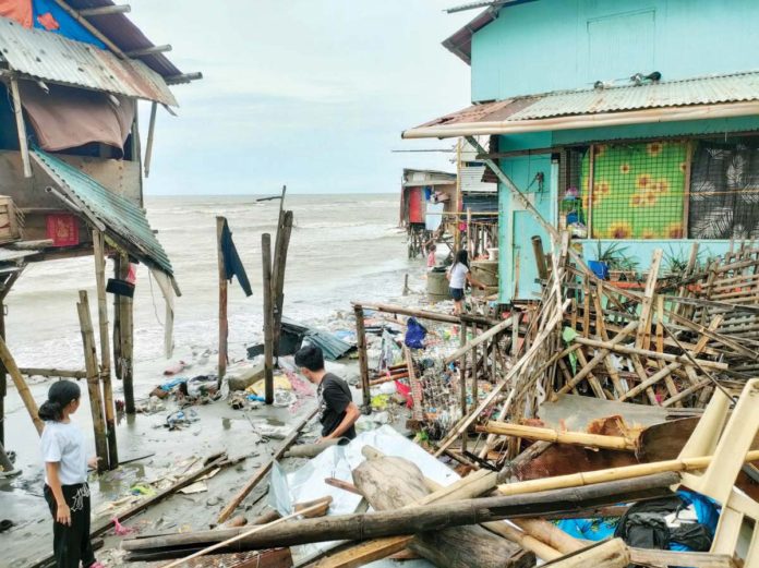 Several houses in the coastal area of Zone 5 in Barangay Boulevard, Molo, Iloilo City were damaged by strong winds and big waves on Sunday, July 21. Affected residents were forced to evacuate. AJ PALCULLO/PN