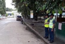 Two police officers conduct beat patrol along the Bacolod City National High School campus. BACOLOD CITY POLICE STATION 6 FILE PHOTO