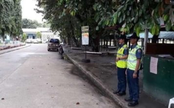 Two police officers conduct beat patrol along the Bacolod City National High School campus. BACOLOD CITY POLICE STATION 6 FILE PHOTO