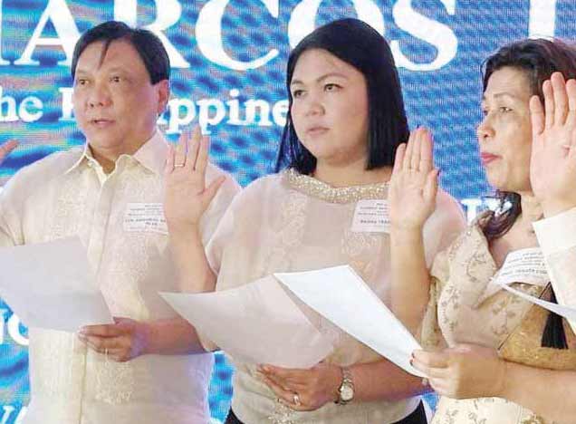 Raisa Treñas-Chu (2nd from left) takes her oath as a member of the National Unity Party at the Manila Golf and Country Club in Makati City on Saturday, June 29. JERRY TREÑAS/FACBOOK PHOTO