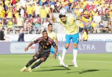 Brazil defender Marquinhos (4) heads the ball away from Colombia forward Jhon Cordoba (24). PHOTO COURTESY OF DARREN YAMASHITA/USA TODAY SPORTS